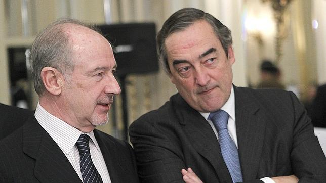 Rato asegura que no hay negociaciones para una fusión de Bankia con CaixaBank