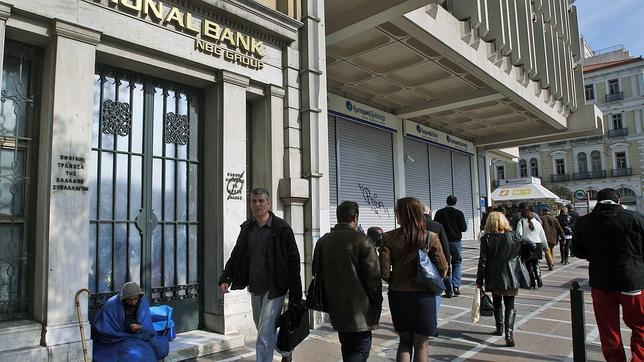 Grecia anuncia que el 95,7% de sus acreedores acepta la quita de la deuda