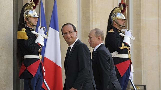 Putin, aliado de Assad, recibe nuevas presiones en Francia por las matanzas en Siria