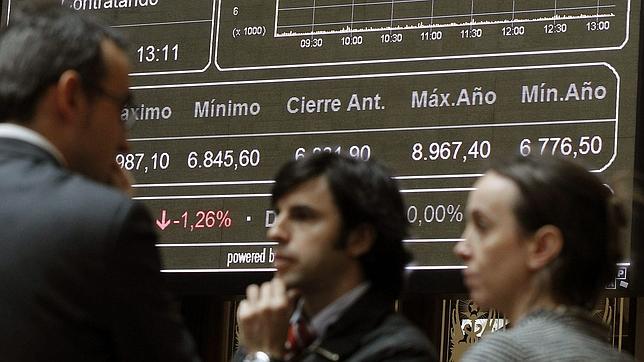 La prima de riesgo española baja tras la subasta del Tesoro