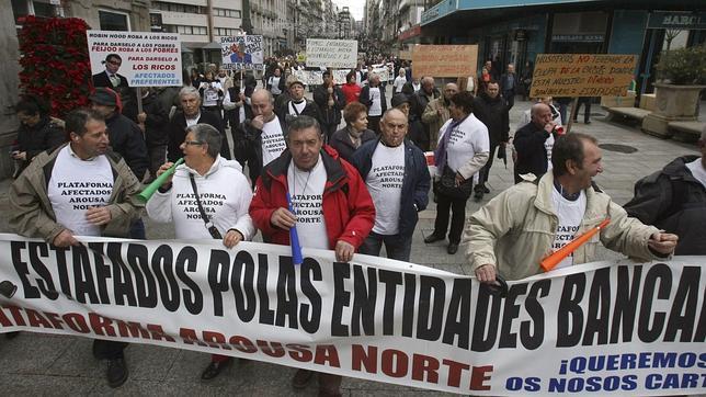 Quitas extra a los preferentistas de NCG y CatalunyaBanc que no renuncien al juez