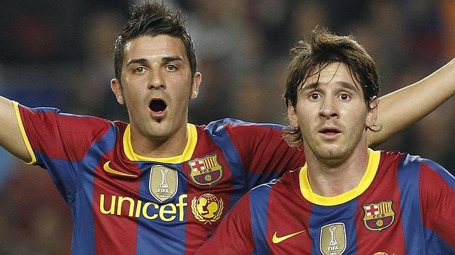 Villa y Messi, durante un partido con el Barcelona