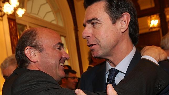 Soria y Guindos explican la reforma energética a los inversores de Wall Street