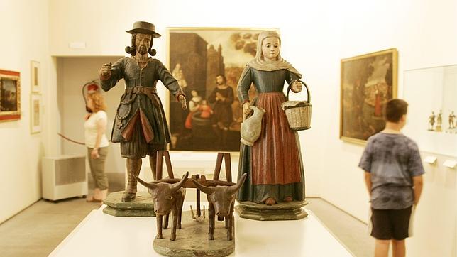 Figuras de madera de San Isidro Labrador y su esposa, Santa María dela Cabeza