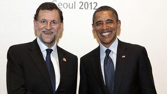Los cuatro saludos de Rajoy y Obama