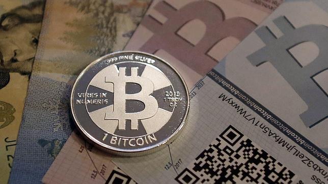 Bitcoin: moneda virtual, regulación de oro
