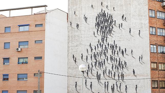 Medianera pintada con las «Ausencias» de Suso33