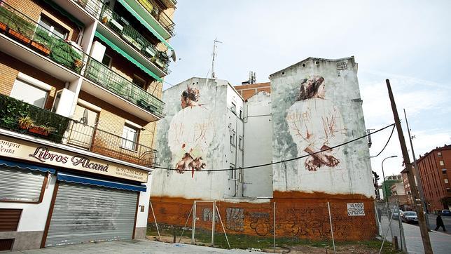 Obra de Borondo sobre la medianería de la calle Marqués de Viana, en Tetuán