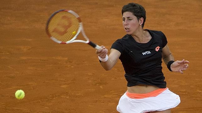 Feliciano López y Carla Suarez sonríen en Madrid
