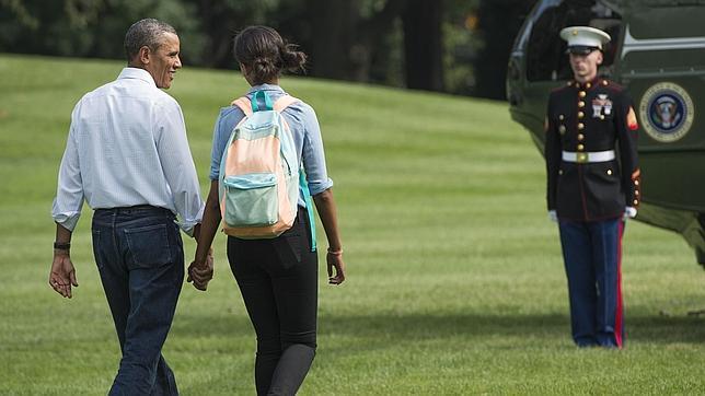 Los disturbios de Ferguson e Irak amargan las vacaciones a Obama