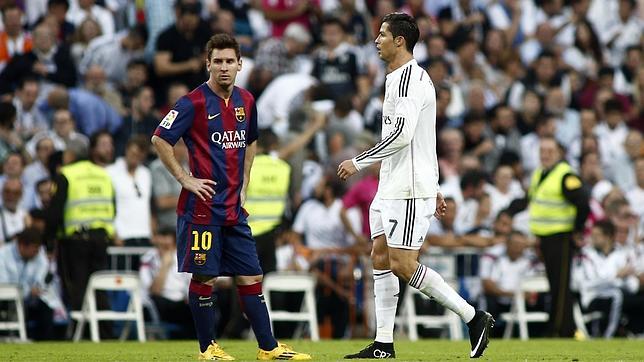 Messi y Cristiano durante el último clásico