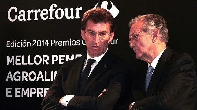El titular de la Xunta, Alberto Núñez Feijóo, junto al presidente de Carrefour, Rafael Arias-Salgado