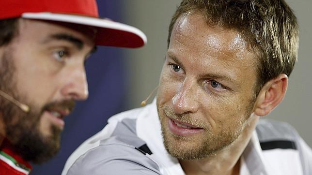 Jenson Button, con Fernando Alonso en Abu Dabi