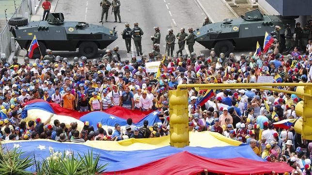 Partidarios del candidato presidencial venezolano Enrique Capriles protestan en Mérida, Venezuela