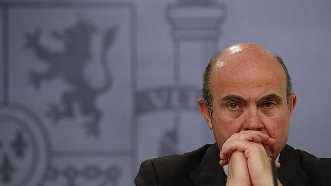 De Guindos sostiene que España devolverá el tercer pago anticipado del rescate bancarioen julio