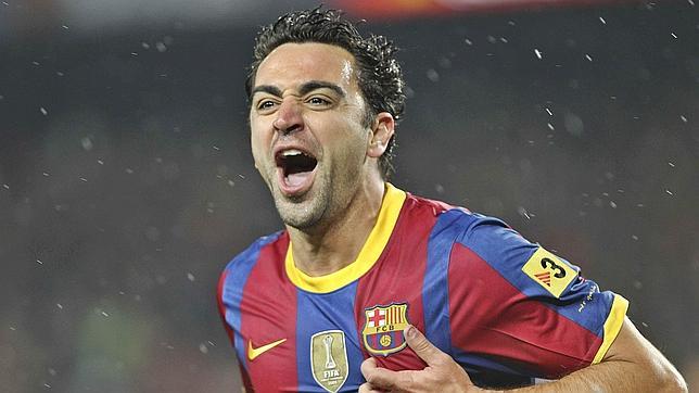 Xavi Hernández celebra un gol con el Barcelona en 2010
