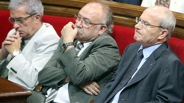 El conseller de Interior, Joan Saura, junto a Carod Rovira y Montilla en 2010