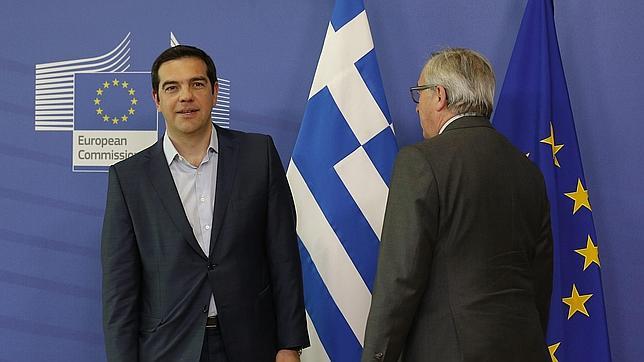 El presidente de la Comisión Europea, Jean-Claude Juncker, y el primer ministro griego, Alexis Tsipras
