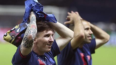 Messi sujeta una bandera con el clásico bulldog de los Boixos Nois