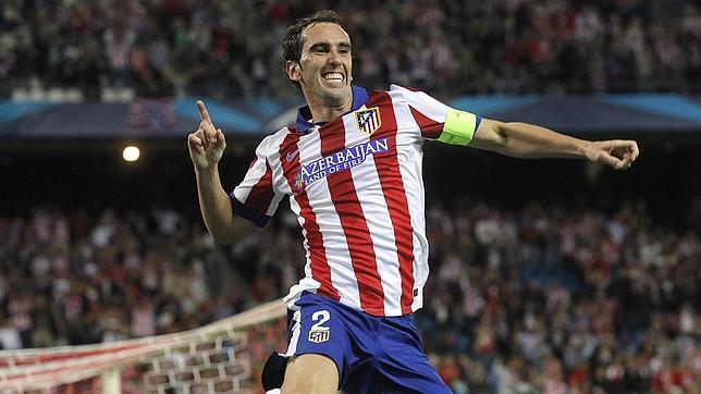 Diego Godín celebra un gol con el Atlético de Madrid