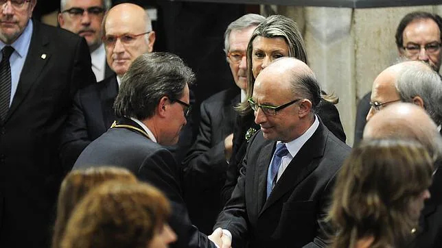 El presidente de la Generalitat, Artur Mas, y el ministro de Hacienda, Cristóbal Montoro