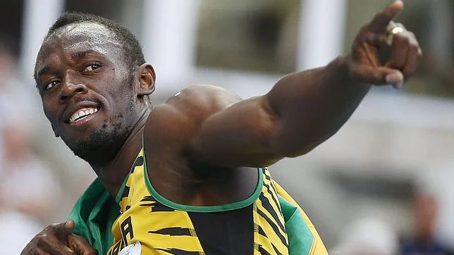 Usain Bolt celebra su triunfo en los 200 m en el Mundial de Moscú 2013