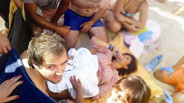 Da a luz en una playa de Lisboa entre aplausos