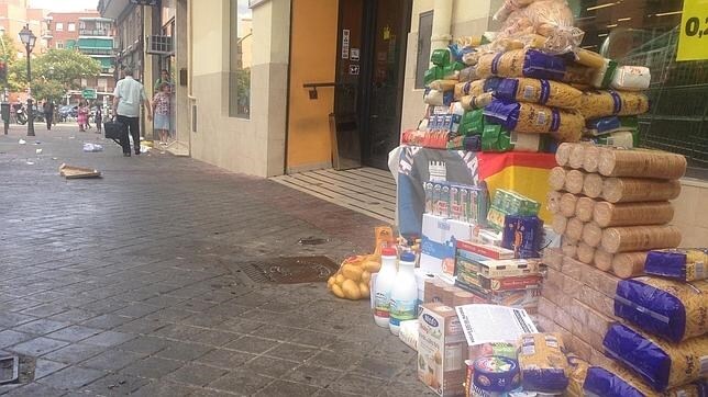 Recogida de alimentos del Hogar Social Madrid en Carabanchel, donde se habría producido el ataque