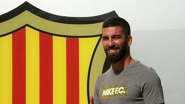 Turan, en su presentación con el Barça