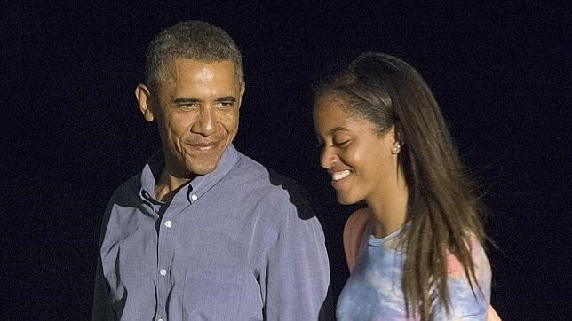 Obama y su hija mayor, Malia en 2014