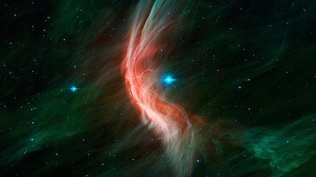 Onda de choque producida por estrella Zeta Opiuchi, en la constelación de Ofiuco, que se mueve a gran velocidad a través del gas interestelar a unos 450 años luz de la Tierra