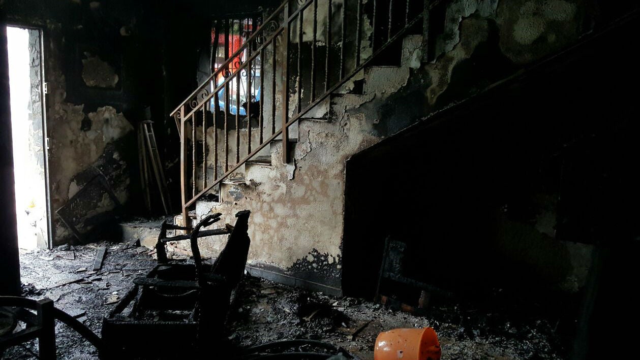 Estado en que quedó la primera planta de la vivienda tras el incendio.