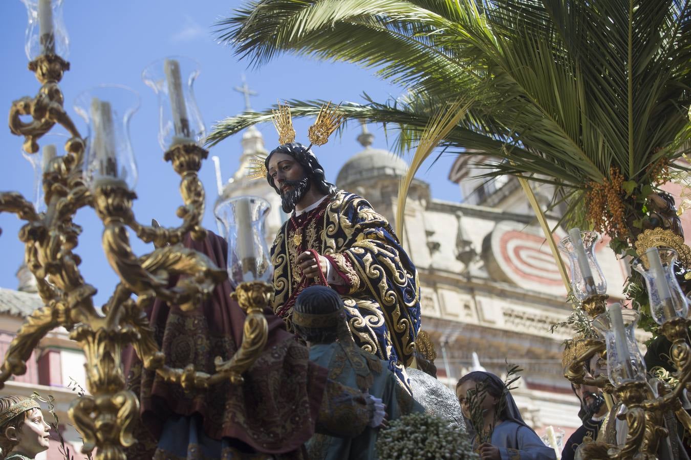 En fotos, La Borriquita abre el Domingo de Ramos en la Semana Santa de Sevilla 2018