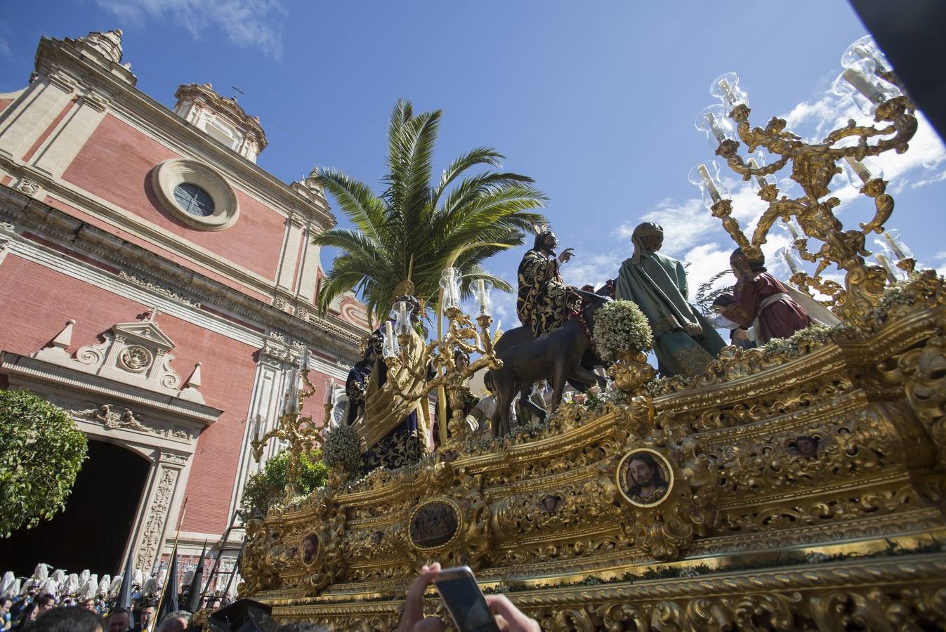 En fotos, La Borriquita abre el Domingo de Ramos en la Semana Santa de Sevilla 2018