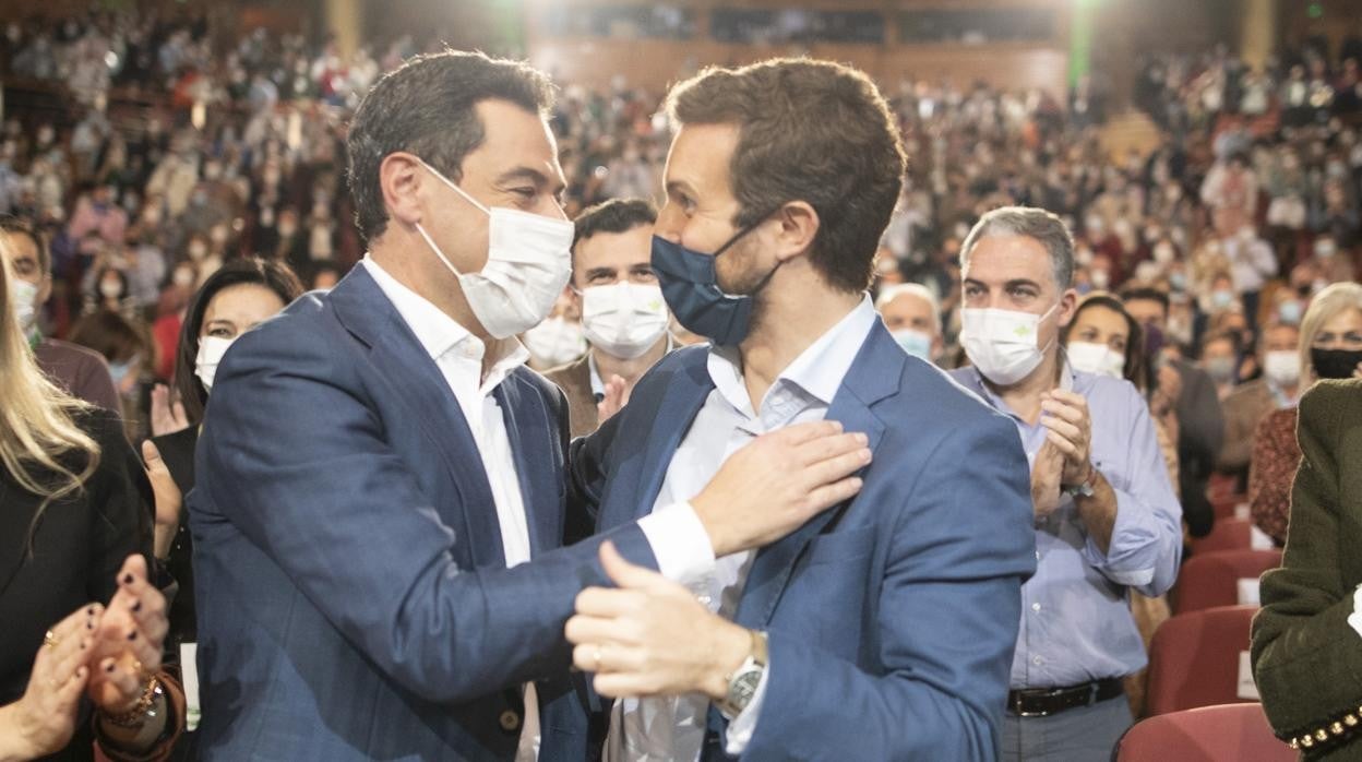 Moreno y Casado, ayer flanqueados por sus esposas