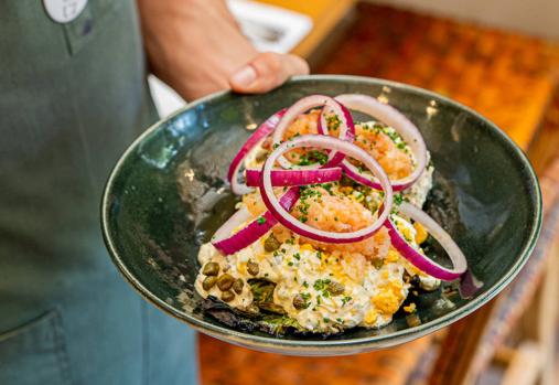Delacruz, la apuesta de Ovejas Negras en Tomares, duplica su espacio con un nuevo local
