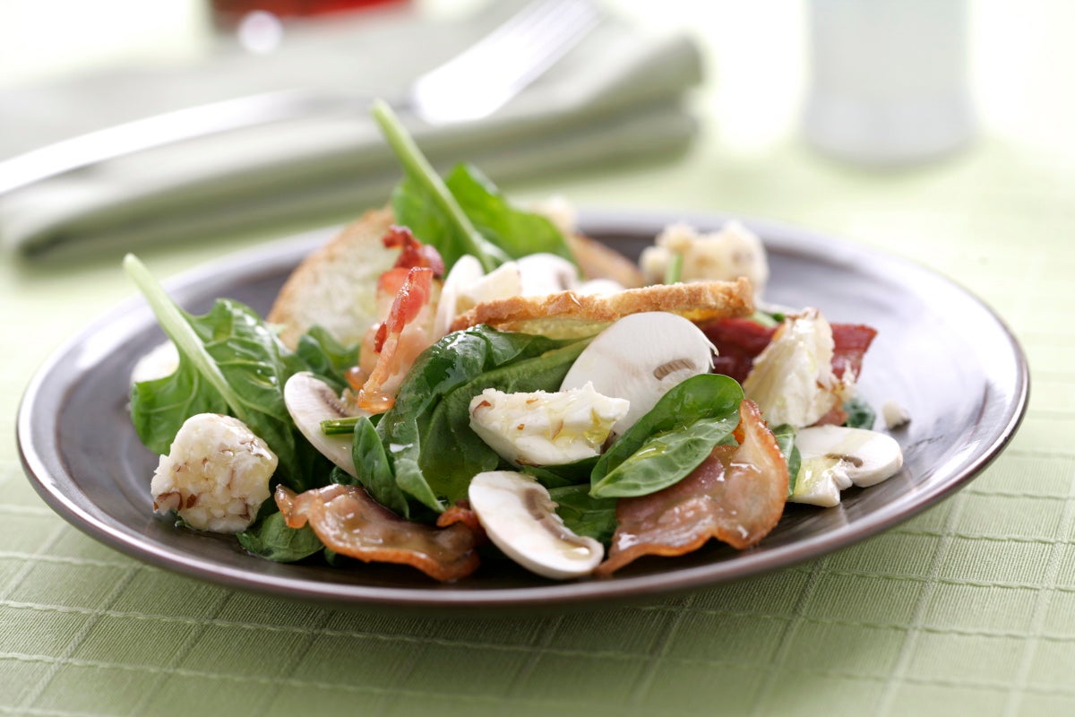 Ensalada de espinacas con queso de cabra y vinagreta de piña - Gurmé