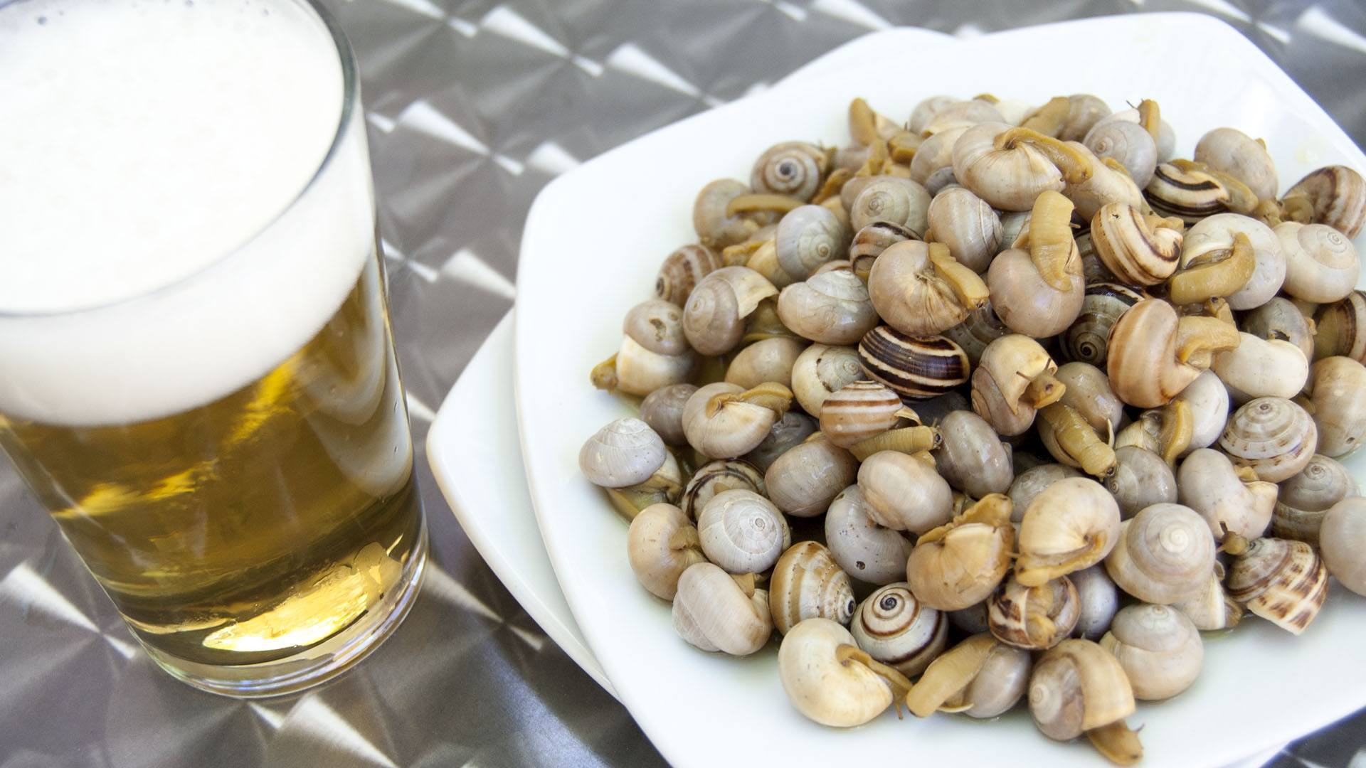 ¿Me pone una de caracoles para llevar?