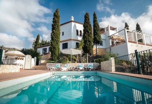 Zona de la piscina y la casa