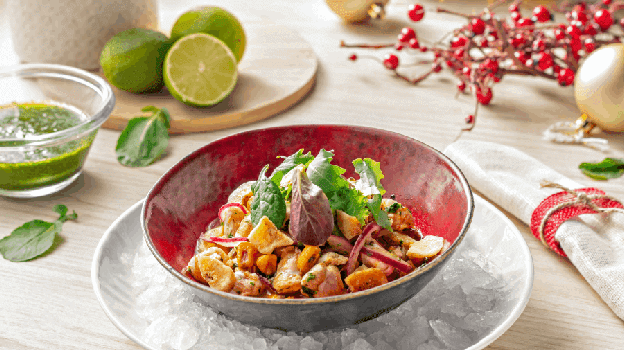 Ceviche de pescado con brotes y aceite de berros.