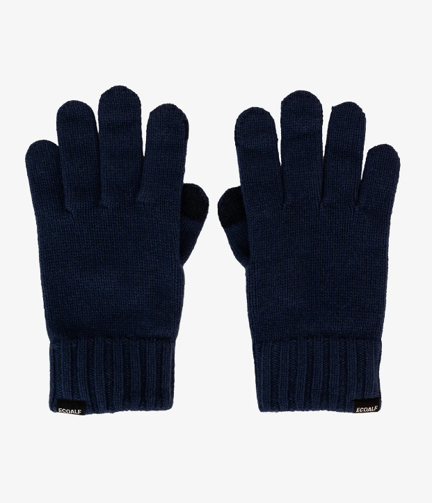 Los guantes Wool están hechos de 65% lana reciclada, la alternativa que usamos en ECOALF para evitar el uso de materiales vírgenes de origen animal. Los dedos táctiles te permitirán usar el móvil manteniendo las manos abrigadas del frío.