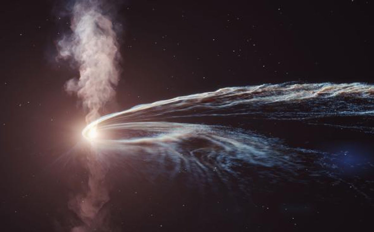 La ilustración muestra cómo un agujero negro tritura una estrella antes de engullirla