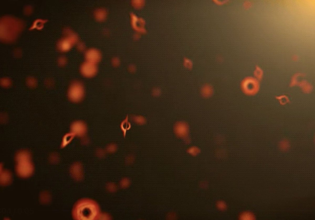 La ilustración muestra una serie de hipotéticos agujeros negros primordiales