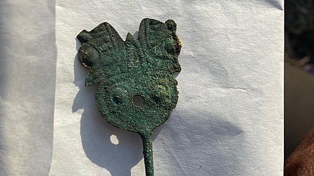 El 'tupu' hallado a la altura de la boca de uno de los niños