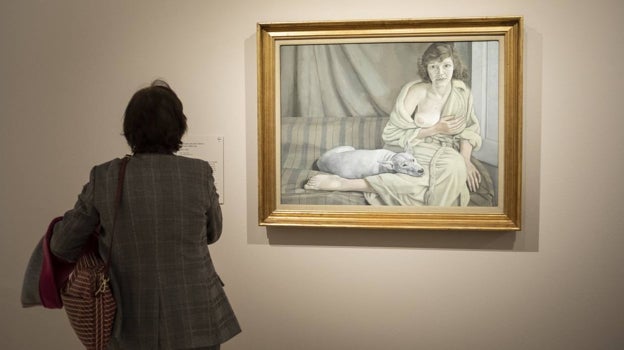 Uno de los los retratos que Lucian Freud pintó de su primera esposa, Kitty Garman: 'Muchacha con perro blanco' (1951-52). Tate