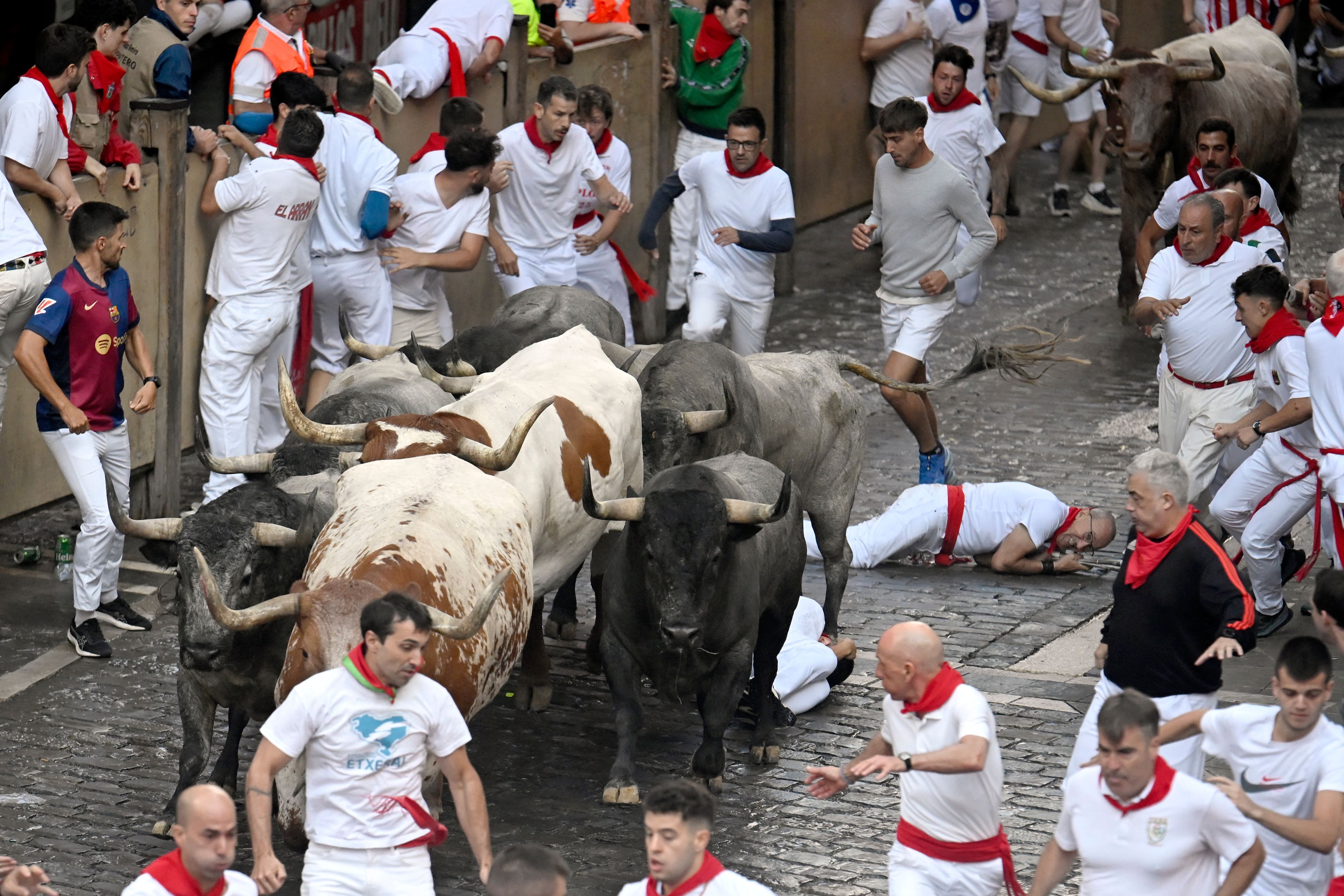 El sexto encierro de los Sanfermines, en imágenes