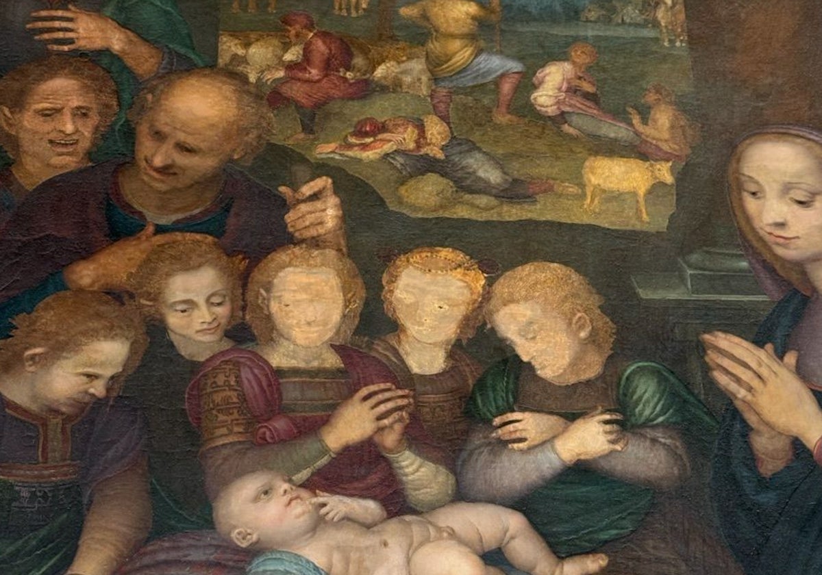 Detalle de la Adoración de los Pastores de Yáñez de Almedilla en la que se ven algunos rostros borrados