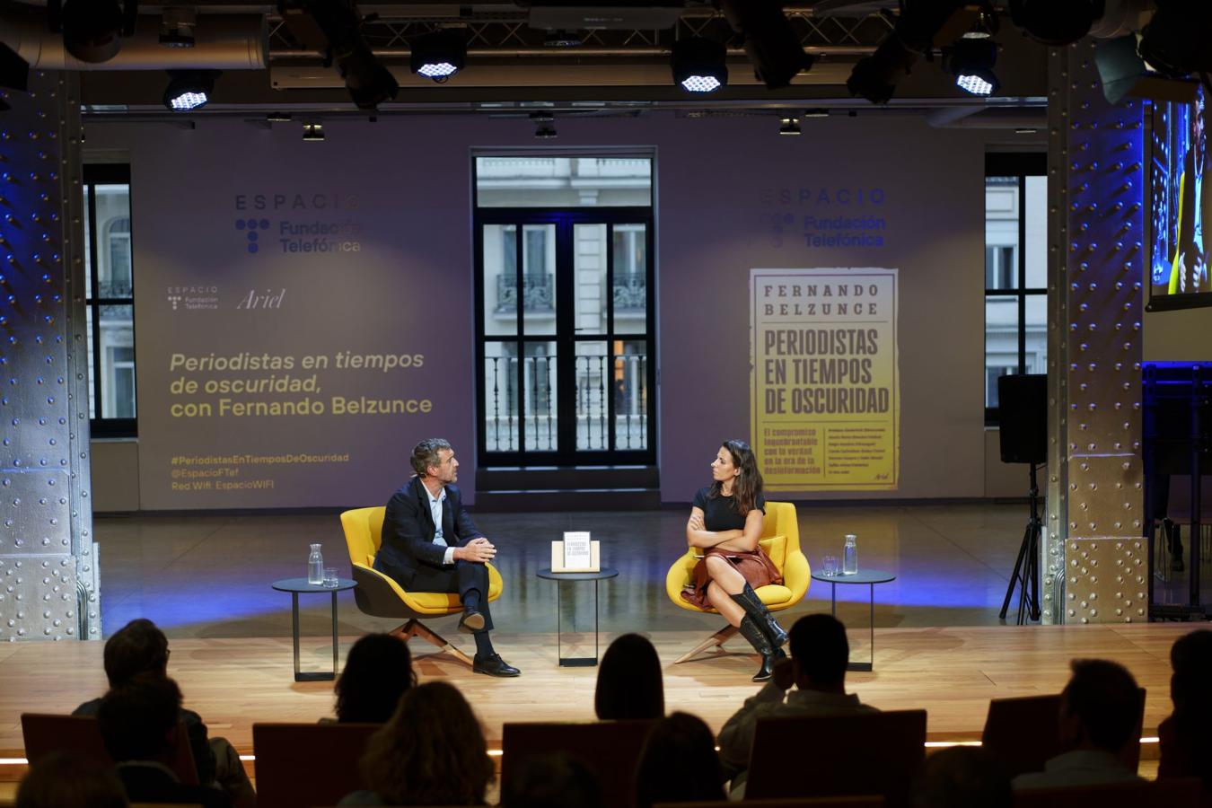 Belzunce y Pastor, durante el coloquio.