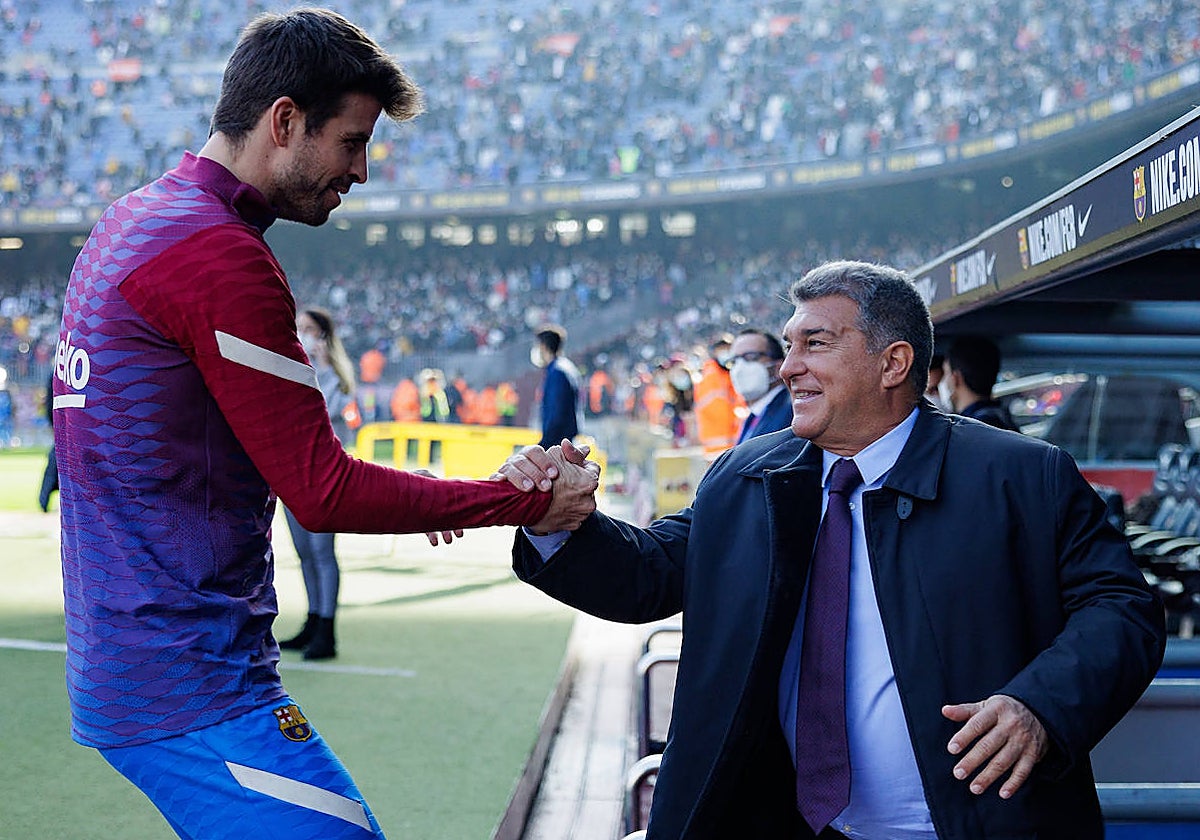 Gerard Piqué y Joan Laporta