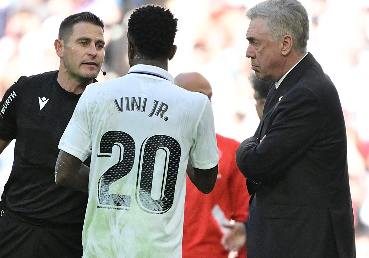 Vini, Ancelotti y Figueroa Vázquez